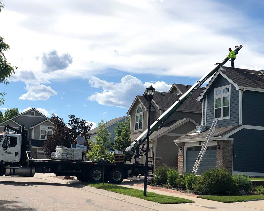 roofers working on home roof fort collins co